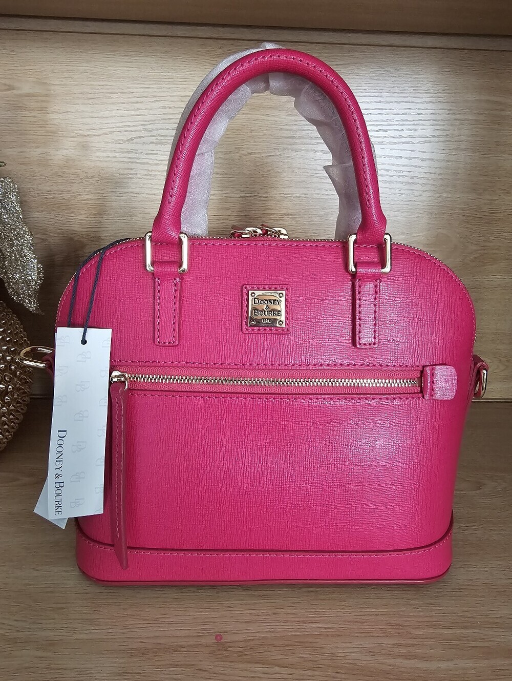 NWT. Dooney & Bourke Hot Pink Domed Satchel with Gold Accents.